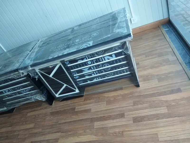 Office tables wrapped and ready for delivery, made by Lahore Carpenter in Lahore