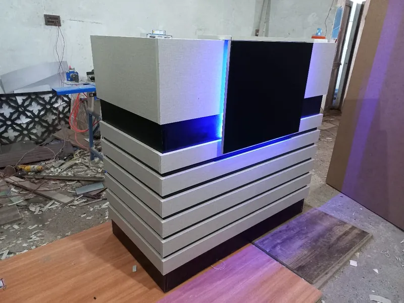 Reception counter with LED lighting and layered front